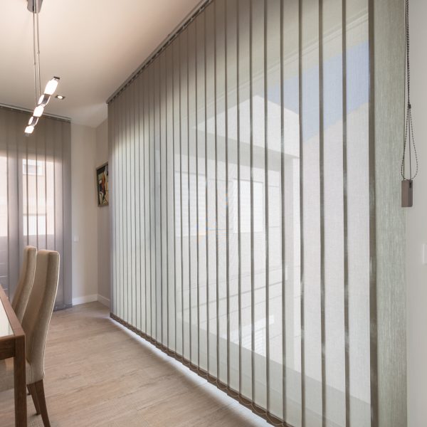 Vertical curtain blinds bring harmony to a family home