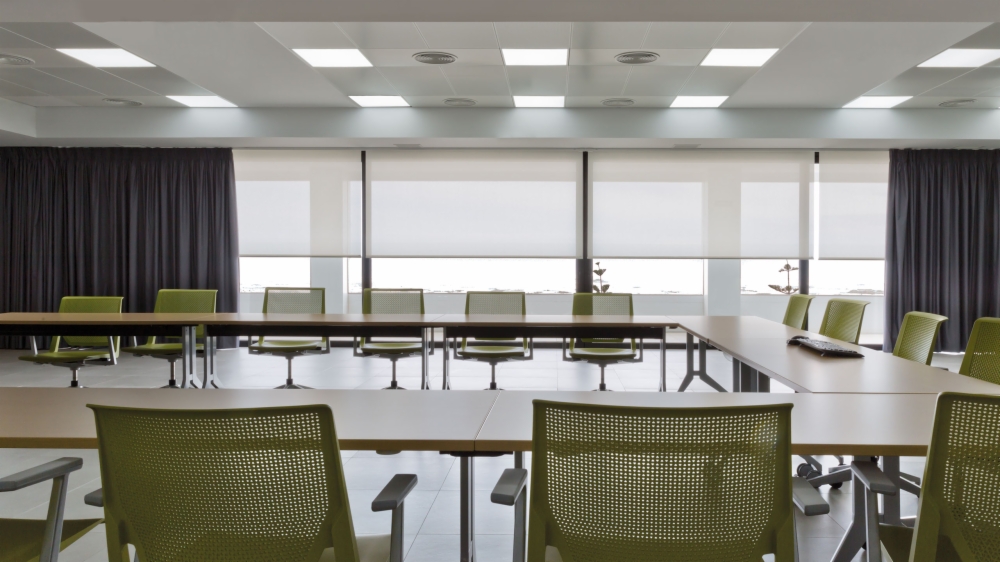 Roller blinds protecting office users in Andalusia