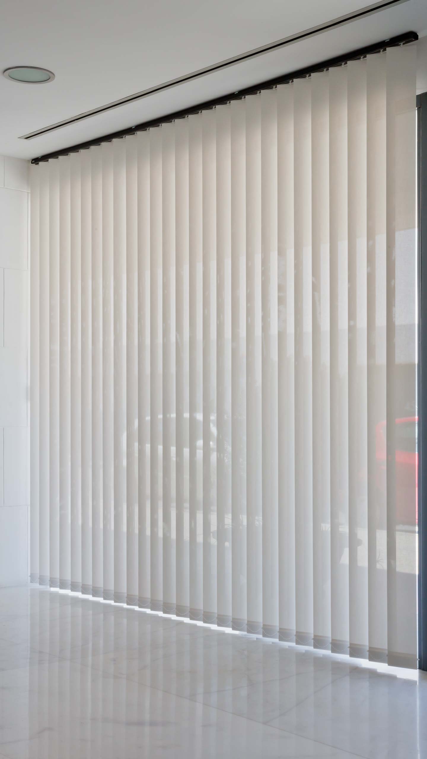Producción Globo Correctamente Cortinas verticales al servicio del confort en el trabajo